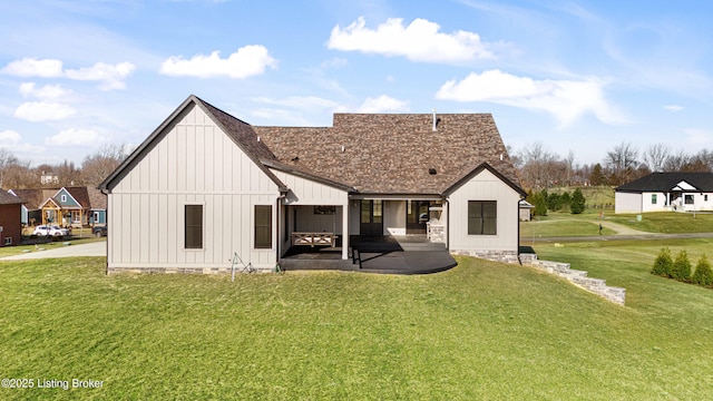 4907 Sycamore Ridge Ln, La Grange, KY 40031 - rear view of house with board and batten siding, a patio, a yard, and roof with shingles