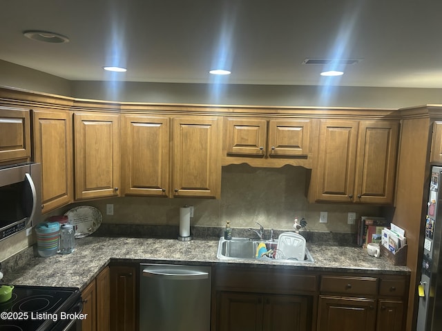 105B Twin Oaks Dr, Bardstown, KY 40004 - kitchen featuring stainless steel appliances, a sink, and brown cabinets