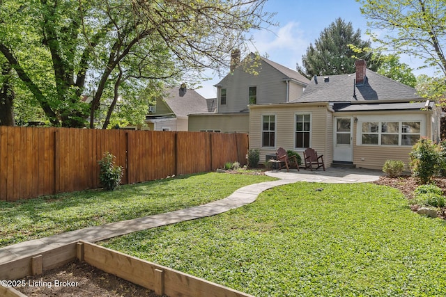 2023 Alta Ave, Louisville, KY 40205 - back of property with a patio area, a chimney, and a shingled roof