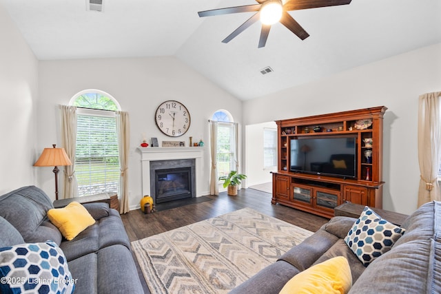 10119 Vista Springs Way, Louisville, KY 40291 - living room with ceiling fan, plenty of natural light, a glass covered fireplace, vaulted ceiling, and wood finished floors
