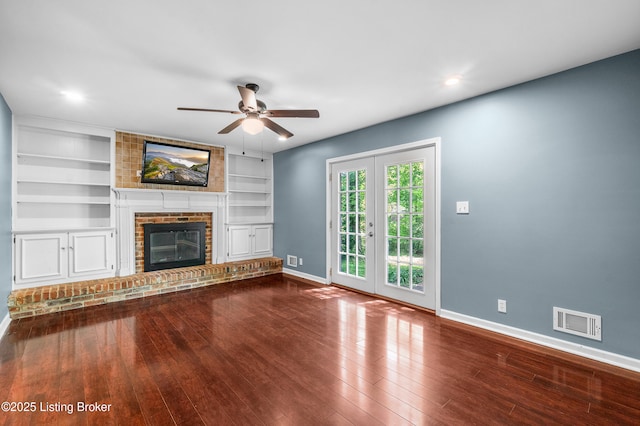 1312 Pollitt Ct, Louisville, KY 40223 - unfurnished living room with baseboards, a ceiling fan, wood finished floors, a brick fireplace, and built in features