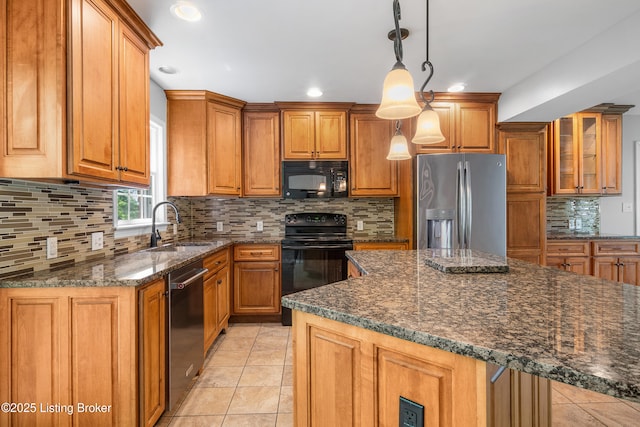 1312 Pollitt Ct, Louisville, KY 40223 - kitchen featuring black appliances, a sink, brown cabinets, decorative backsplash, and recessed lighting