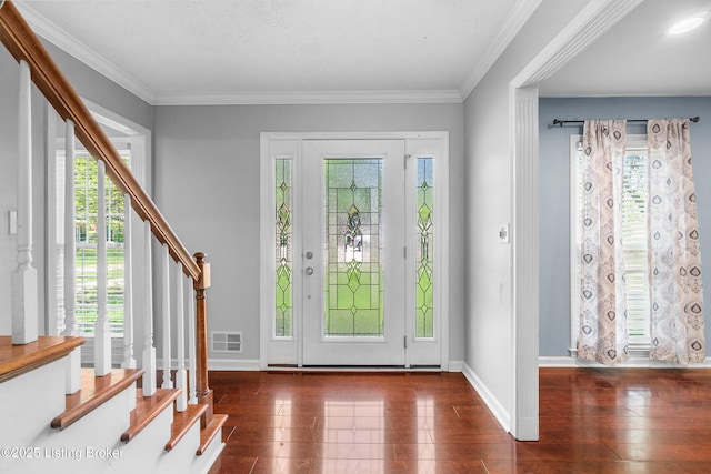 1312 Pollitt Ct, Louisville, KY 40223 - foyer with stairway, baseboards, ornamental molding, and wood finished floors
