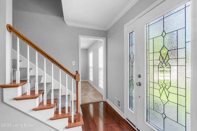 1312 Pollitt Ct, Louisville, KY 40223 - entryway featuring crown molding, baseboards, wood finished floors, and stairs