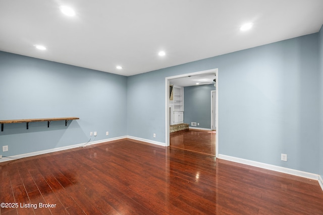 1312 Pollitt Ct, Louisville, KY 40223 - unfurnished room with wood finished floors, baseboards, and recessed lighting
