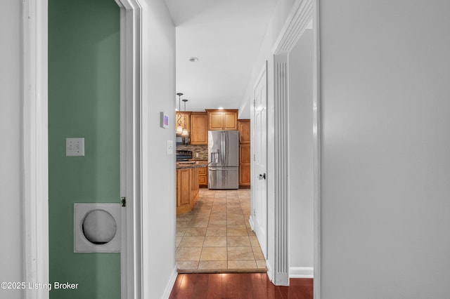1312 Pollitt Ct, Louisville, KY 40223 - corridor featuring baseboards and light wood-style floors