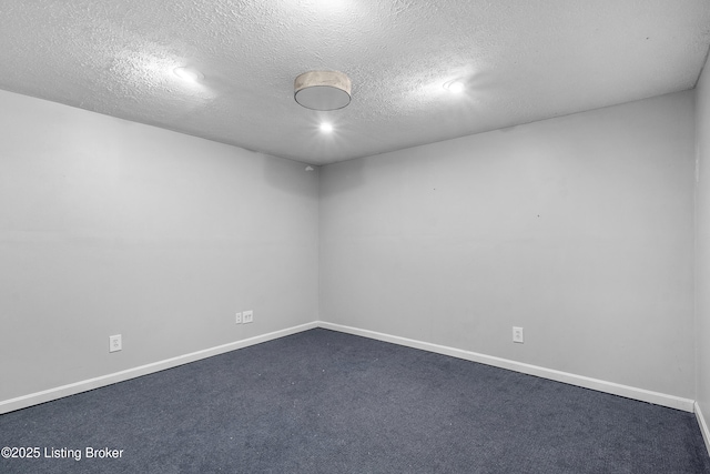 1312 Pollitt Ct, Louisville, KY 40223 - empty room with a textured ceiling, baseboards, dark carpet, and recessed lighting
