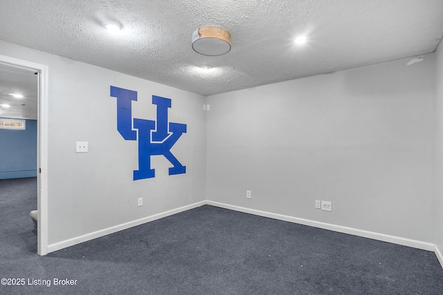 1312 Pollitt Ct, Louisville, KY 40223 - empty room featuring dark carpet, baseboards, a textured ceiling, and recessed lighting