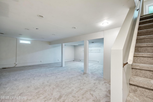 1312 Pollitt Ct, Louisville, KY 40223 - below grade area featuring stairway and light colored carpet