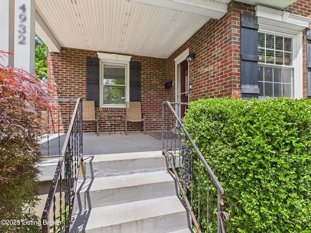 4932 Southern Pkwy, Louisville, KY 40214 - view of exterior entry featuring covered porch and brick siding