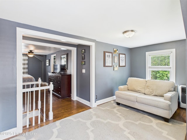4932 Southern Pkwy, Louisville, KY 40214 - living room featuring dark wood finished floors, baseboards, and ceiling fan