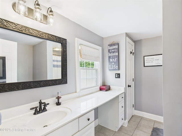 4932 Southern Pkwy, Louisville, KY 40214 - full bath with vanity, tile patterned flooring, and baseboards
