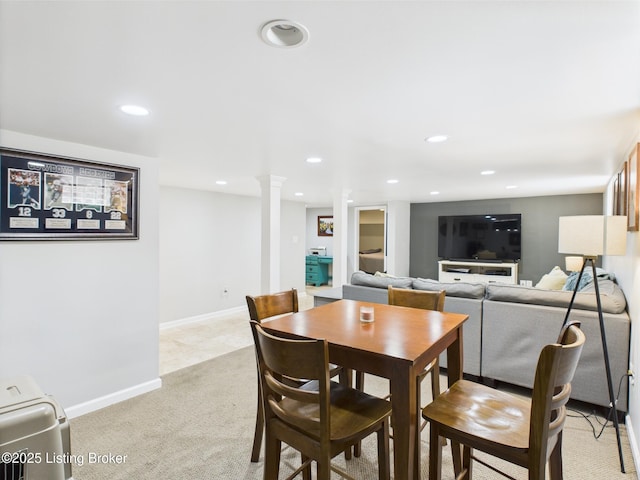 4932 Southern Pkwy, Louisville, KY 40214 - dining area with recessed lighting, light colored carpet, baseboards, and decorative columns