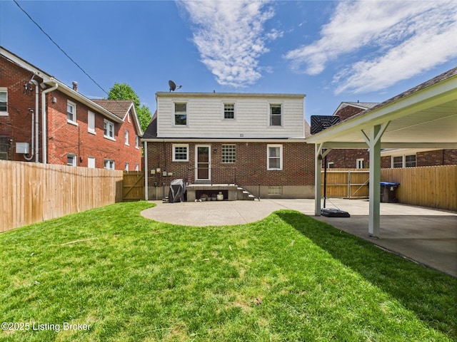 4932 Southern Pkwy, Louisville, KY 40214 - back of property with a patio and brick siding