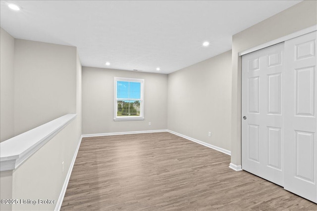 102 Limestone Ct, Shepherdsville, KY 40165 - empty room featuring wood finished floors, recessed lighting, and baseboards