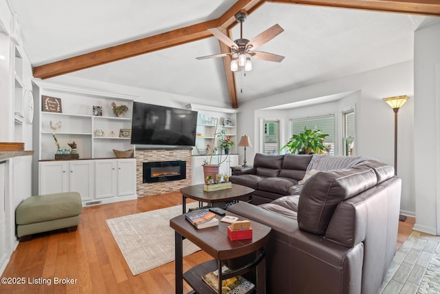 94 Tarnwood Dr, Brandenburg, KY 40108 - living area featuring a ceiling fan, light wood-type flooring, and a fireplace