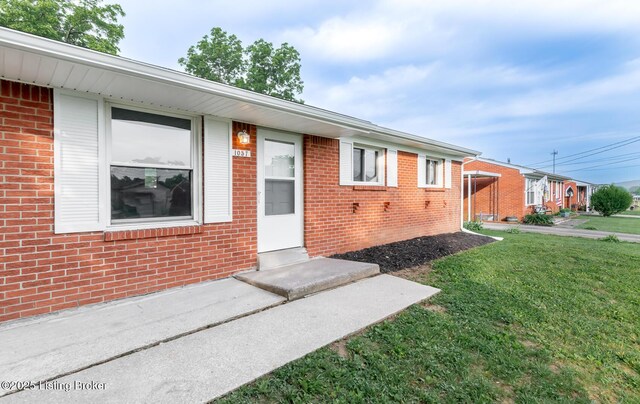 1057 Hillview Blvd, Shepherdsville, KY 40229 - entrance to property featuring a yard and brick siding