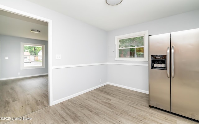 1057 Hillview Blvd, Shepherdsville, KY 40229 - kitchen with stainless steel fridge, wood finished floors, and baseboards
