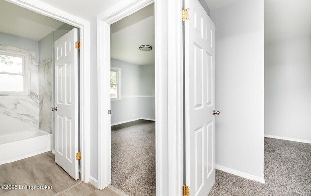 1057 Hillview Blvd, Shepherdsville, KY 40229 - hallway featuring healthy amount of natural light and baseboards