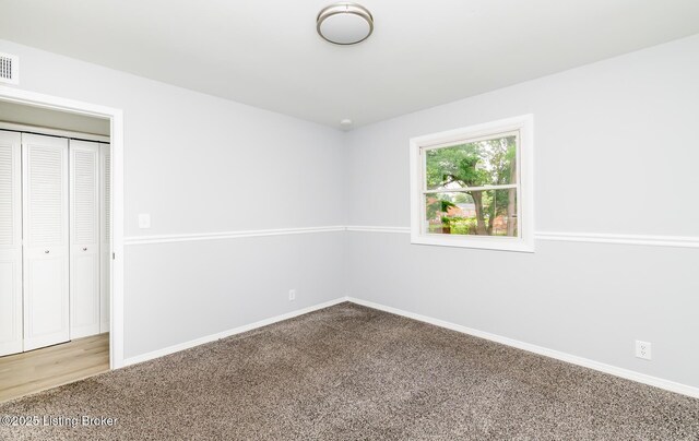 1057 Hillview Blvd, Shepherdsville, KY 40229 - unfurnished bedroom with carpet flooring, baseboards, and a closet