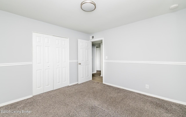 1057 Hillview Blvd, Shepherdsville, KY 40229 - unfurnished bedroom with carpet, a closet, and baseboards
