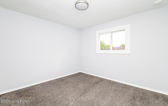 1057 Hillview Blvd, Shepherdsville, KY 40229 - unfurnished room featuring baseboards, dark carpet, and a smoke detector