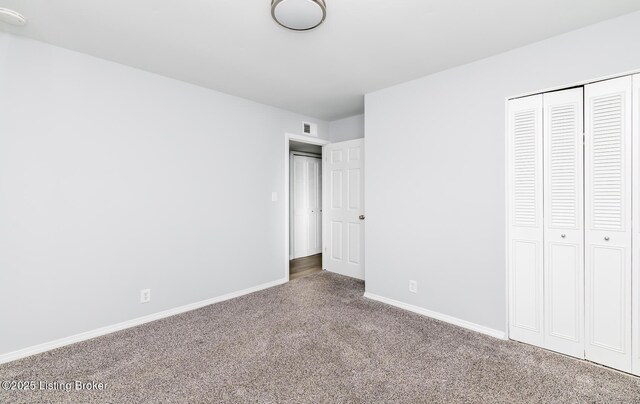 1057 Hillview Blvd, Shepherdsville, KY 40229 - unfurnished bedroom with carpet, a closet, and baseboards