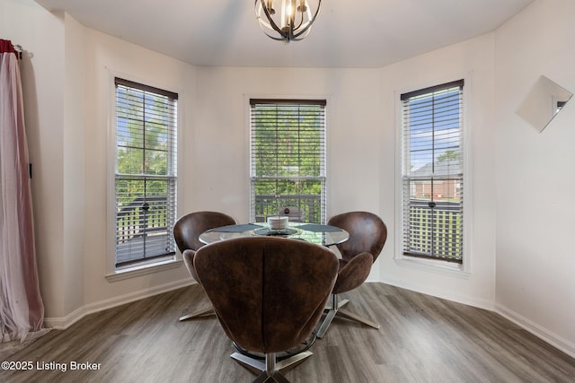 6820 Grandfield Rd, Louisville, KY 40258 - sitting room featuring wood finished floors, a chandelier, and baseboards