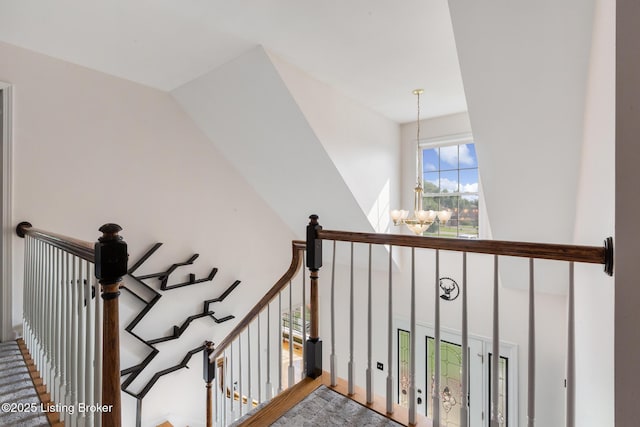 6820 Grandfield Rd, Louisville, KY 40258 - stairs featuring a chandelier and a towering ceiling