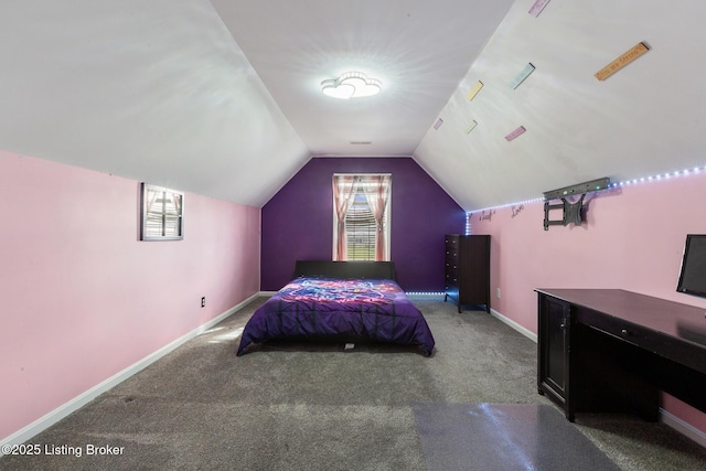 6820 Grandfield Rd, Louisville, KY 40258 - carpeted bedroom featuring multiple windows, vaulted ceiling, and baseboards