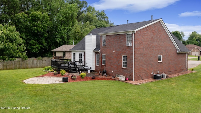 6820 Grandfield Rd, Louisville, KY 40258 - back of house featuring a patio, a deck, brick siding, central AC unit, and a chimney