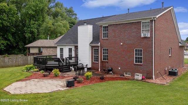 6820 Grandfield Rd, Louisville, KY 40258 - back of house featuring a patio, a chimney, a wooden deck, and brick siding
