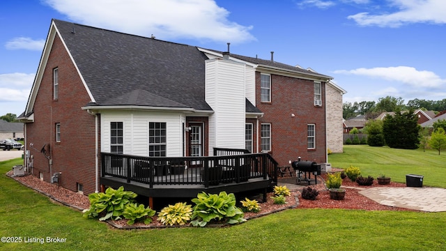 6820 Grandfield Rd, Louisville, KY 40258 - rear view of property featuring a deck, a lawn, brick siding, and a patio