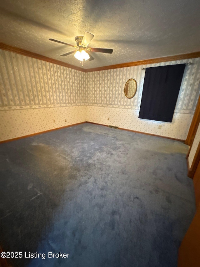 5309 Bardstown Rd, Springfield, KY 40069 - carpeted spare room featuring wallpapered walls, a ceiling fan, a textured ceiling, and crown molding
