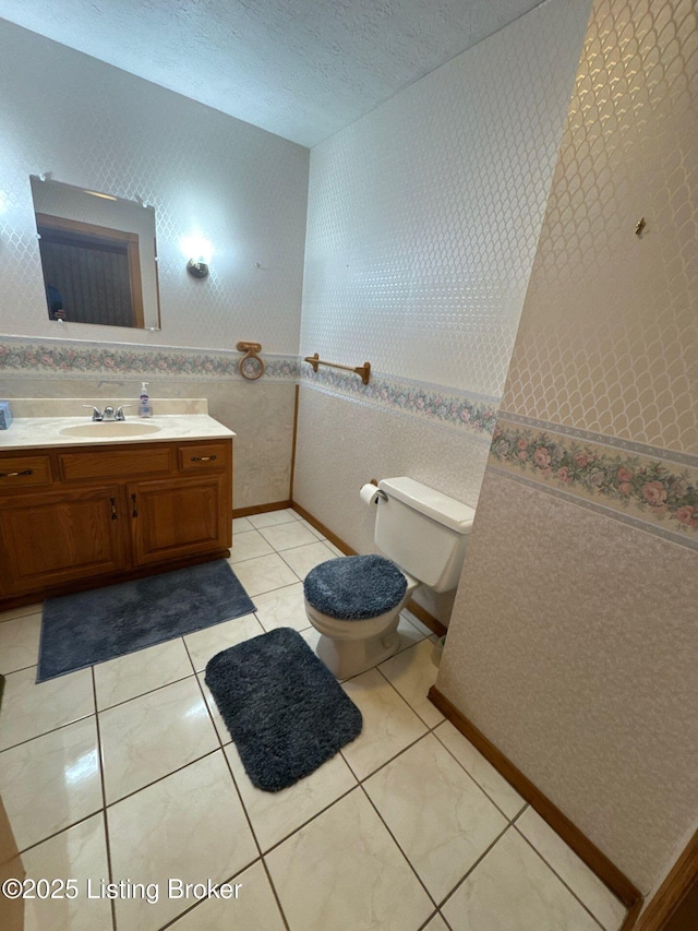 5309 Bardstown Rd, Springfield, KY 40069 - half bath featuring vanity, tile patterned flooring, and a textured ceiling