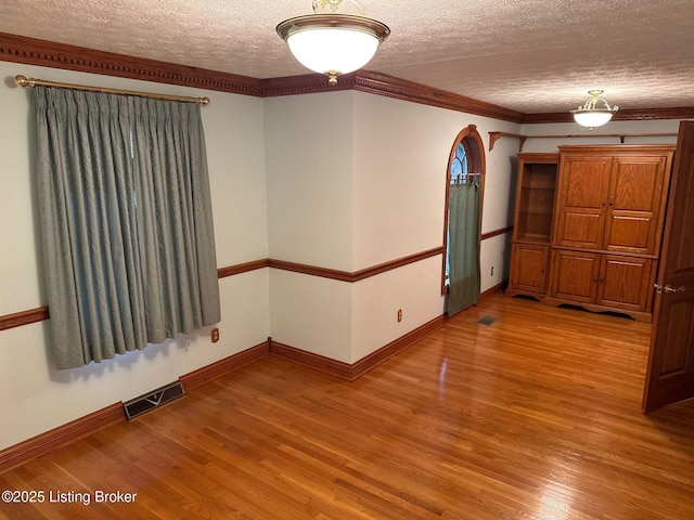 5309 Bardstown Rd, Springfield, KY 40069 - spare room with a textured ceiling and light wood finished floors