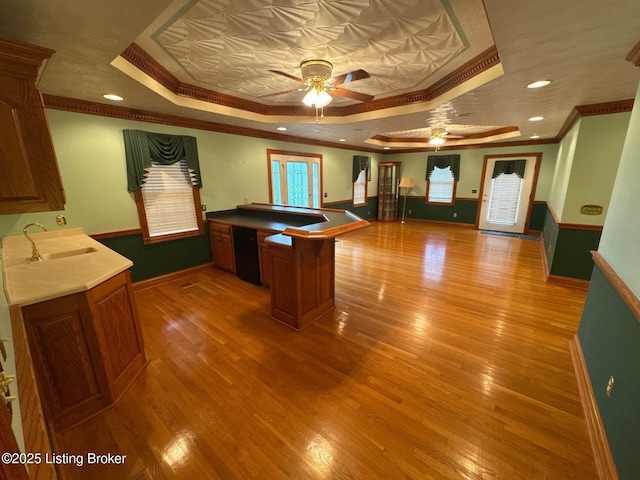 5309 Bardstown Rd, Springfield, KY 40069 - unfurnished office featuring a tray ceiling, ornamental molding, a ceiling fan, and light wood-style flooring