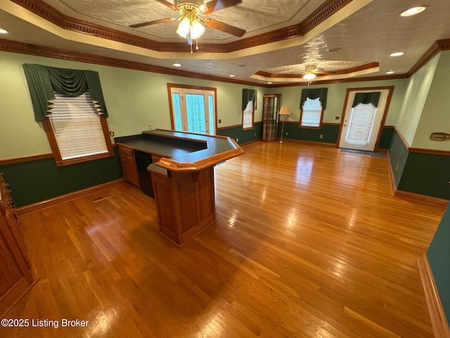 5309 Bardstown Rd, Springfield, KY 40069 - kitchen featuring a tray ceiling, a ceiling fan, ornamental molding, wood finished floors, and recessed lighting