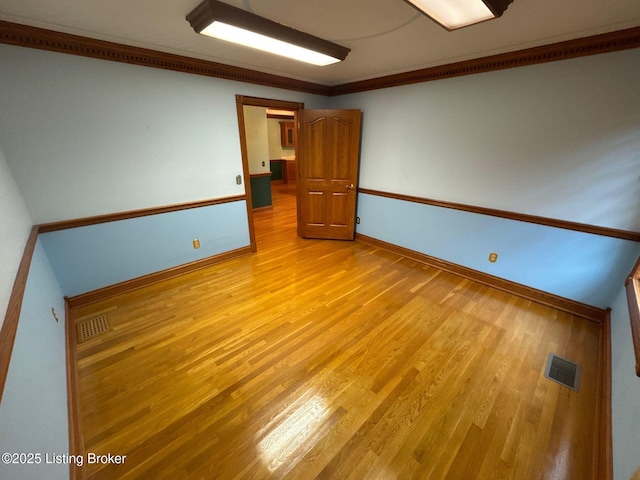 5309 Bardstown Rd, Springfield, KY 40069 - empty room featuring light wood-style flooring and crown molding