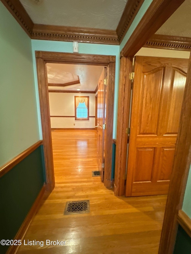 5309 Bardstown Rd, Springfield, KY 40069 - hall featuring wood finished floors and ornamental molding
