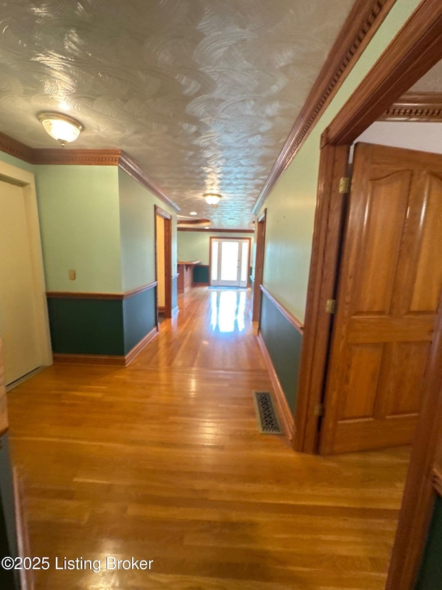 5309 Bardstown Rd, Springfield, KY 40069 - hall with light wood-type flooring and crown molding