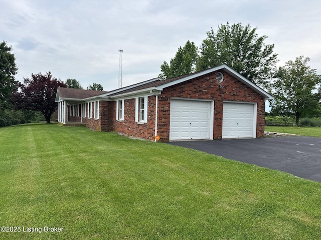 5309 Bardstown Rd, Springfield, KY 40069 - view of property exterior with a lawn, brick siding, and driveway