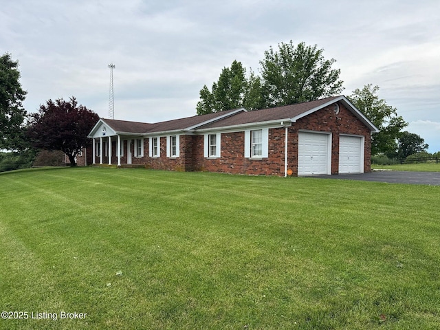 5309 Bardstown Rd, Springfield, KY 40069 - ranch-style house with asphalt driveway, an attached garage, a front lawn, and brick siding