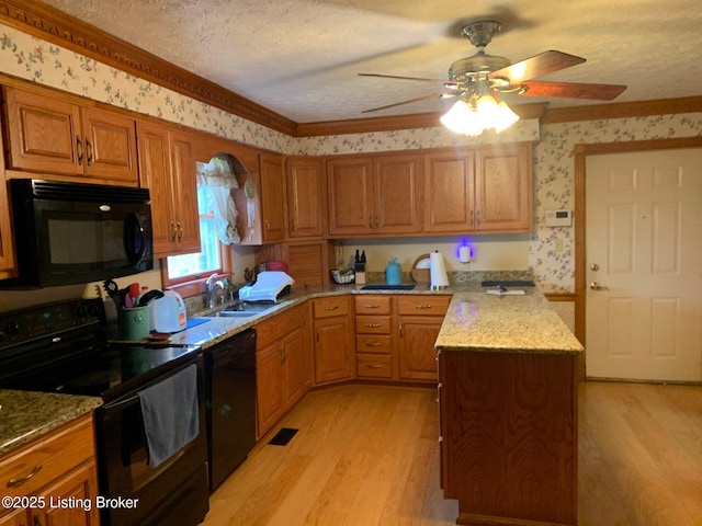 5309 Bardstown Rd, Springfield, KY 40069 - kitchen featuring black appliances, wallpapered walls, light wood-style flooring, ceiling fan, and brown cabinetry
