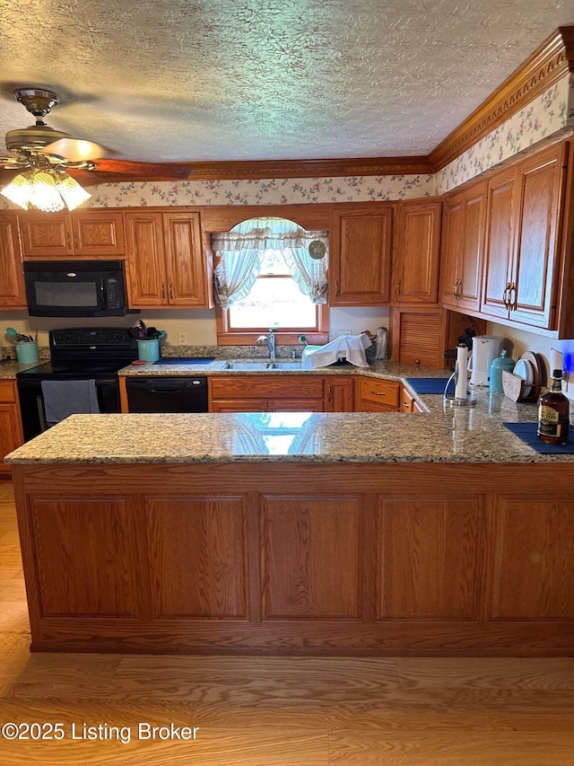 5309 Bardstown Rd, Springfield, KY 40069 - kitchen with black appliances, brown cabinetry, a textured ceiling, light stone countertops, and ceiling fan