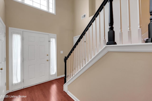 4205 Brownsboro Glen Rd, Louisville, KY 40241 - foyer entrance featuring a towering ceiling, wood finished floors, stairway, and baseboards