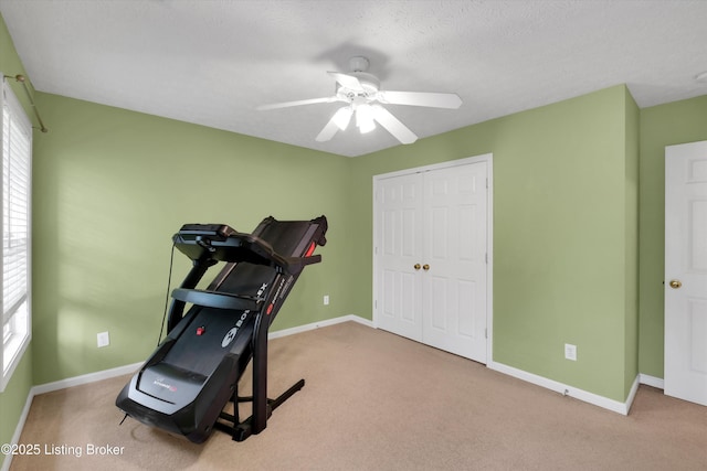 4205 Brownsboro Glen Rd, Louisville, KY 40241 - workout room featuring a ceiling fan, carpet floors, and baseboards