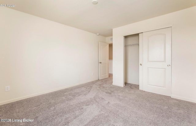 1853 Washington Blvd, Lyndon, KY 40242 - unfurnished bedroom with carpet flooring, a closet, and baseboards
