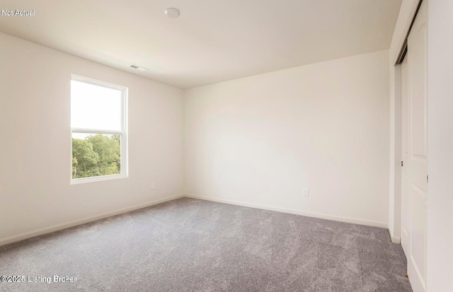 1853 Washington Blvd, Lyndon, KY 40242 - carpeted empty room with baseboards
