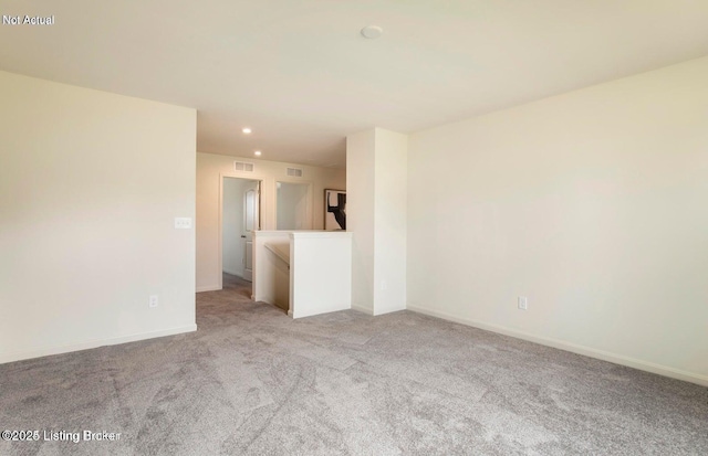 1853 Washington Blvd, Lyndon, KY 40242 - unfurnished living room with light carpet, recessed lighting, and baseboards